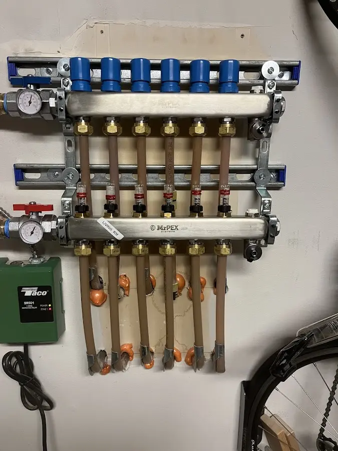 Plumber performing Gas Line Installation at a residential property in Blue Earth